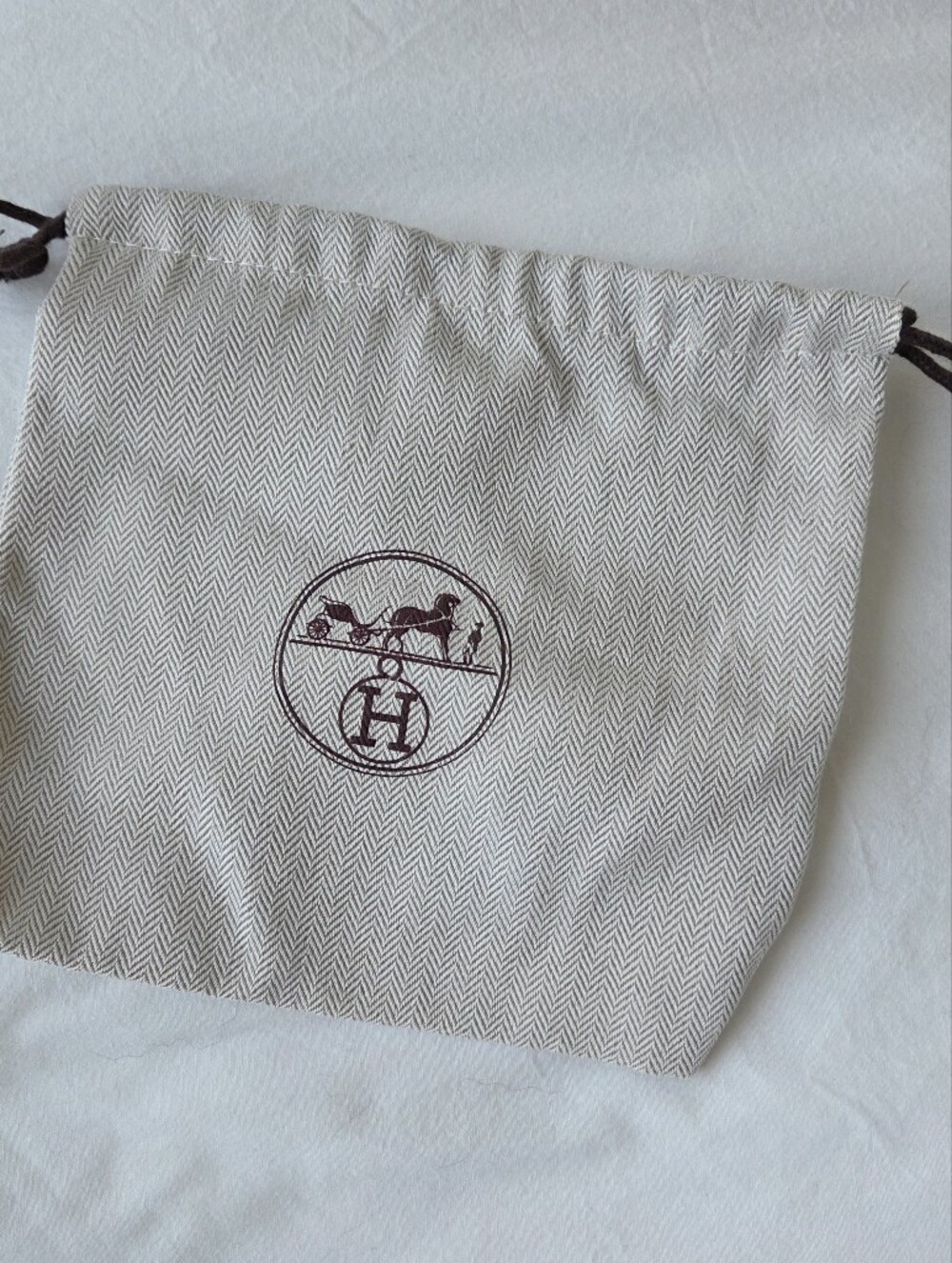 Authentic Hermès drawstring dust bag in beige herringbone canvas with brown logo